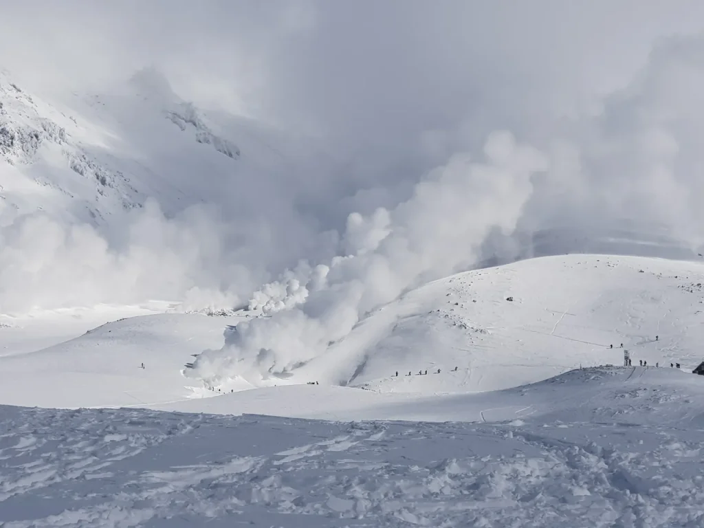 Winter hikers near the fumaroles of Asahidake volcano, Hokkaido