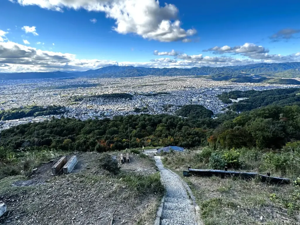The wide view over Kyoto from the open summit area of Mt. Daimonji